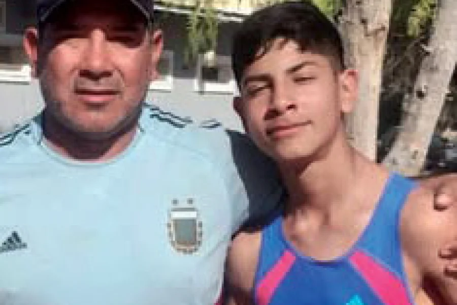Ricardo Ruarte y su entrenador, Walter.